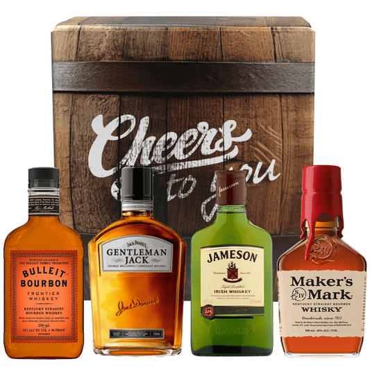 Four 200ml bottles of whiskey in a barrel-themed gift box from the 4 Legends Whiskey Tasting Kit.